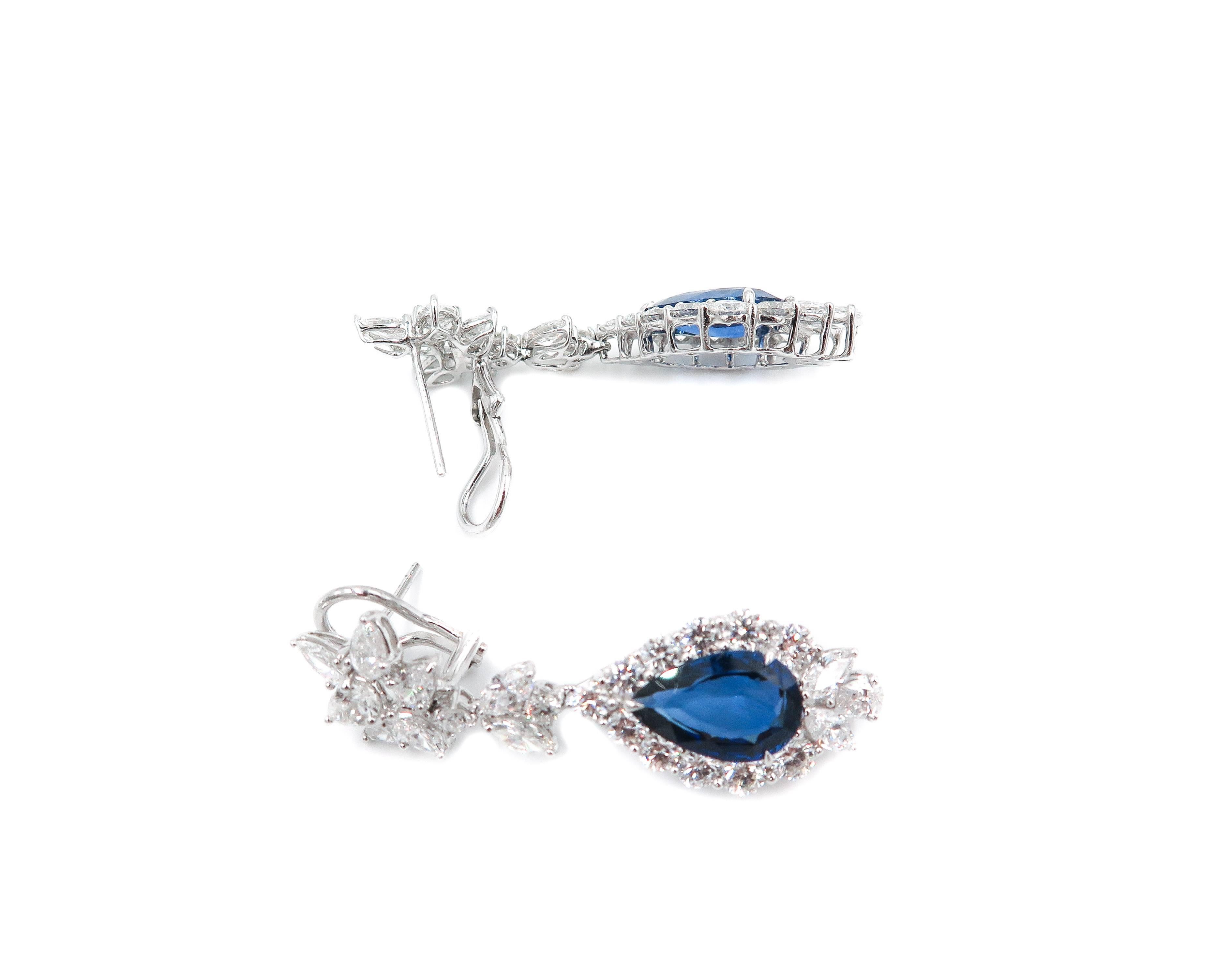 While precious gems inspire and command attention, fantasy and dream prevails in the design of these precious earrings transforming a pair of fine pear shaped blue sapphires and diamonds into a jewelry of distinction.
The sapphires weigh 9.43 carats