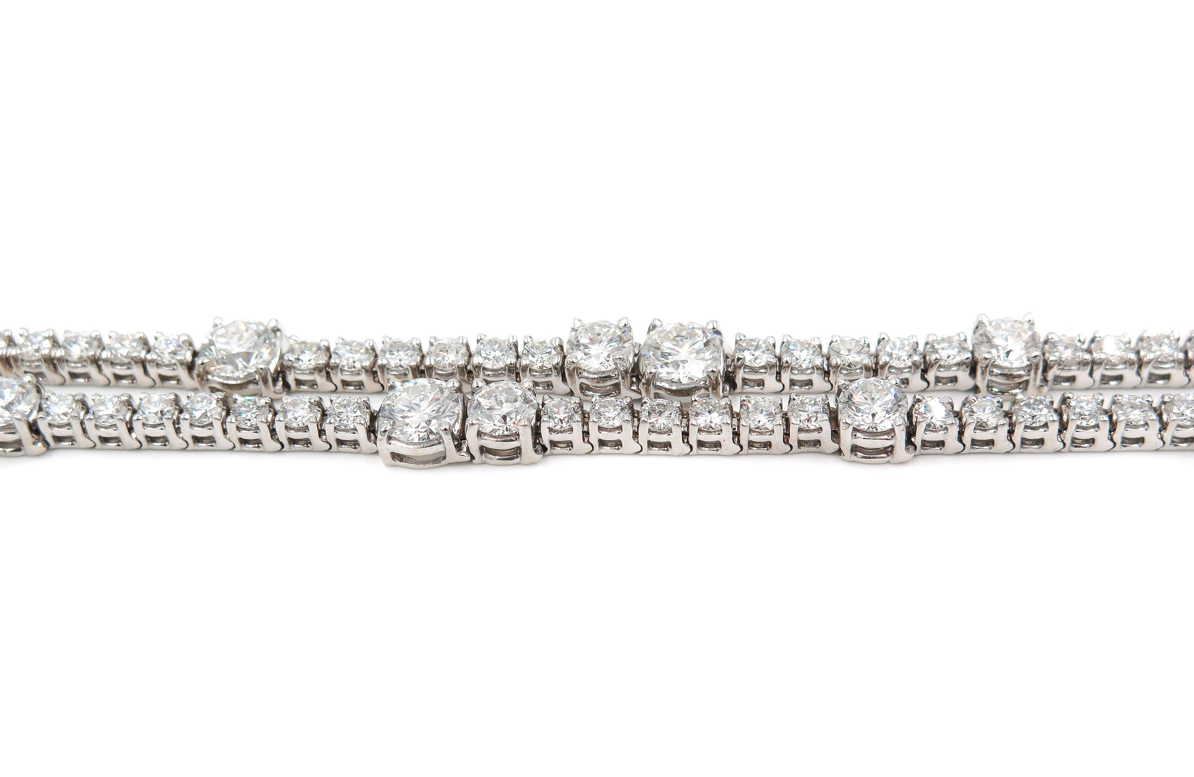 Double Row of white diamonds flowing freely with the utmost elegance. 
A wonderful example of craftsmanship with over 100 diamonds set in this beautiful bracelet handcrafted in 18K white gold. 
Why settle for the standard tennis bracelet when you