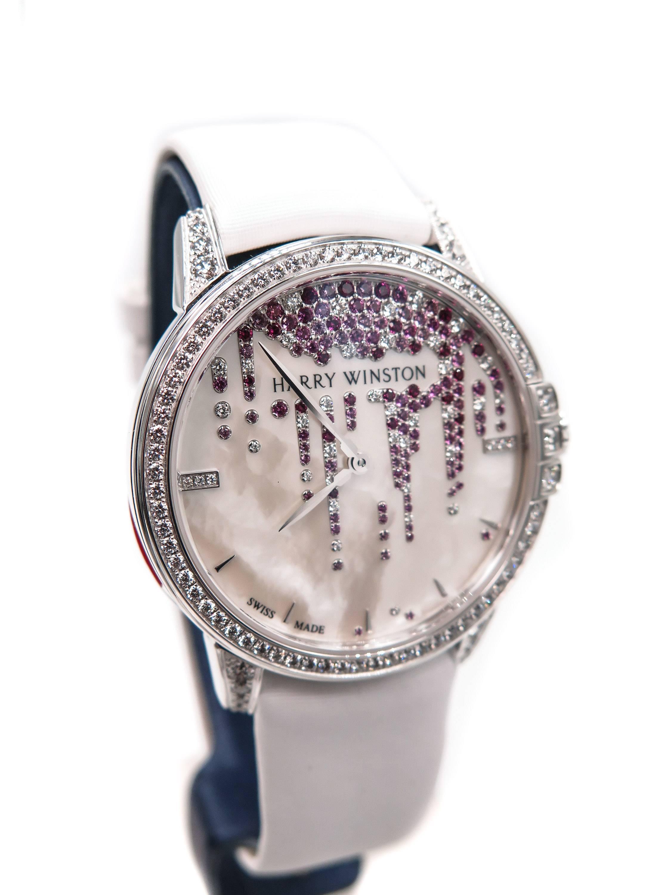 Effortlessly elegant and timelessly classical, this Midnight timepiece is exquisite!
Midnight Diamond Stalactites 36mm in 18k white gold. 
Mechanical automatic winding, 28 jewels, 28,800 vibrations per hour. 
Open sapphire crystal case back.
The