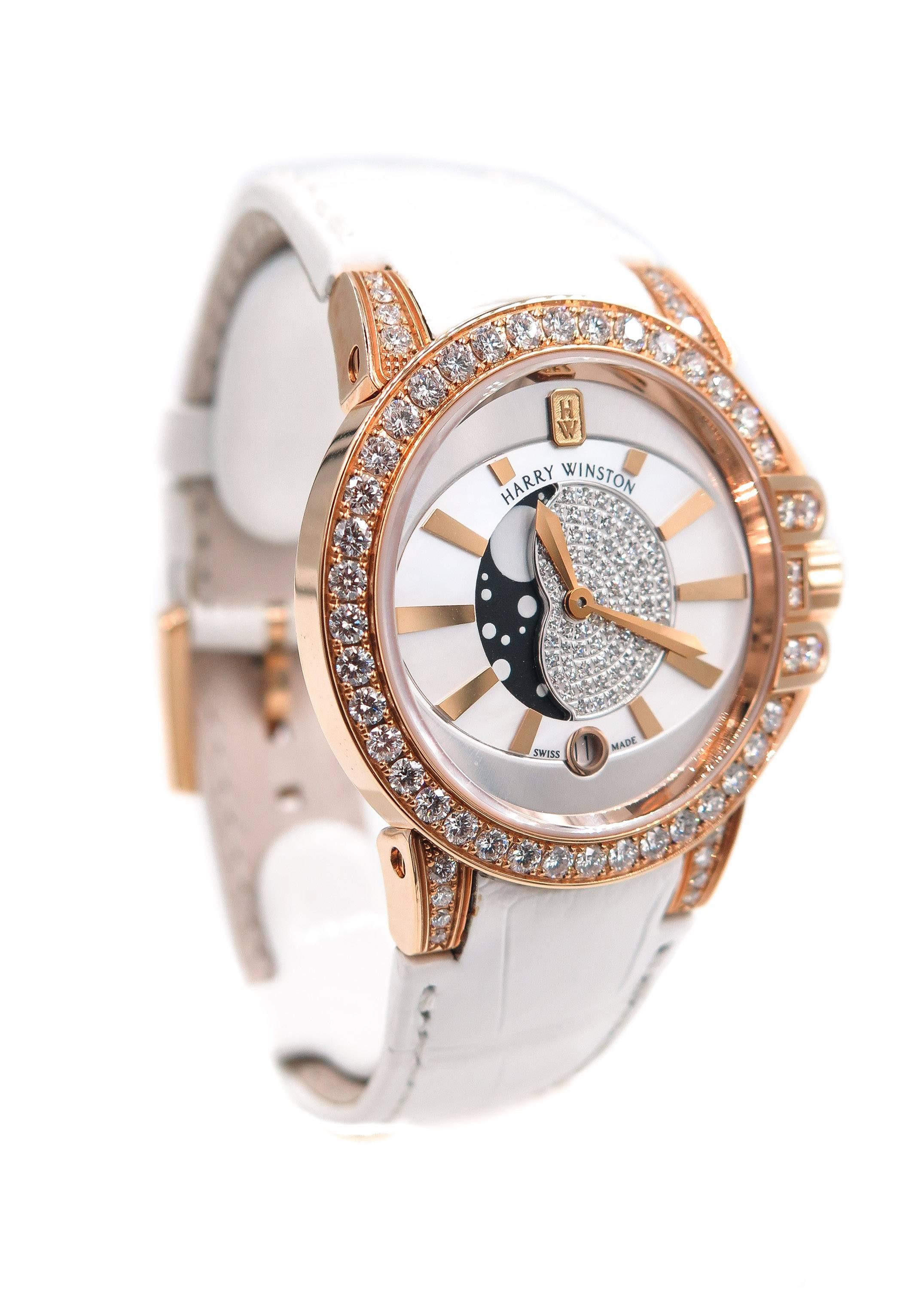 A modern balance of sporty elegance and the flawless execution of the most precious jewels.
This Ocean timepiece of incredible sophistication, features a luxurious rose gold case with a striking combination of white mother-of-pearl center dial,