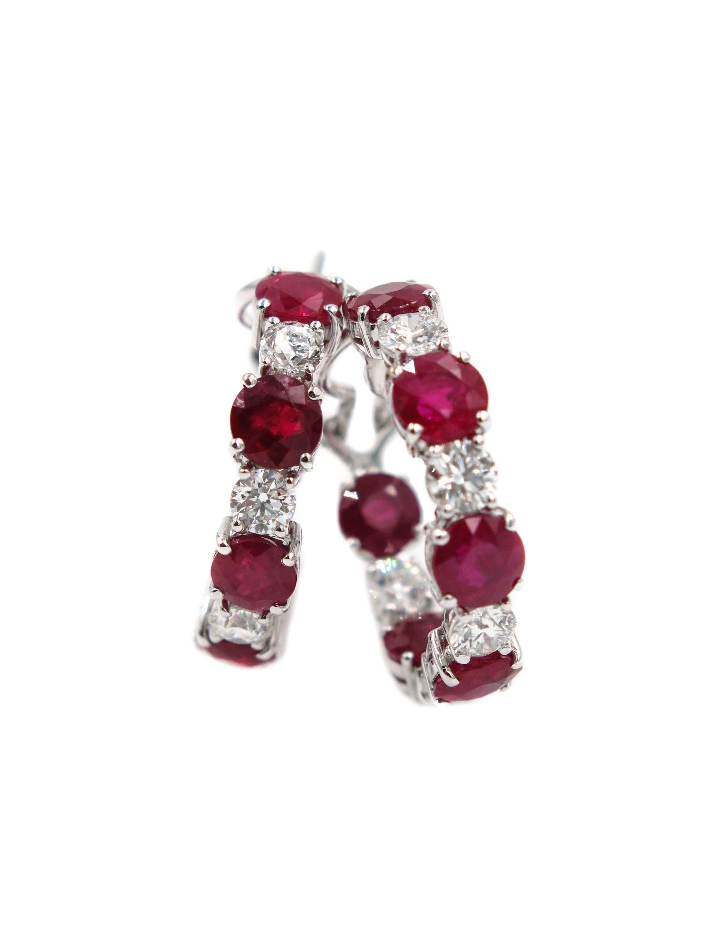Classic and refined, a game of contrast between rubies and diamonds with a feminine design.  
Expertly handcrafted in 18k white gold with 10 round white diamonds weighing 3.03 carats and 12 rubies with a total weigh of 12.49 carats.
Wear them for a