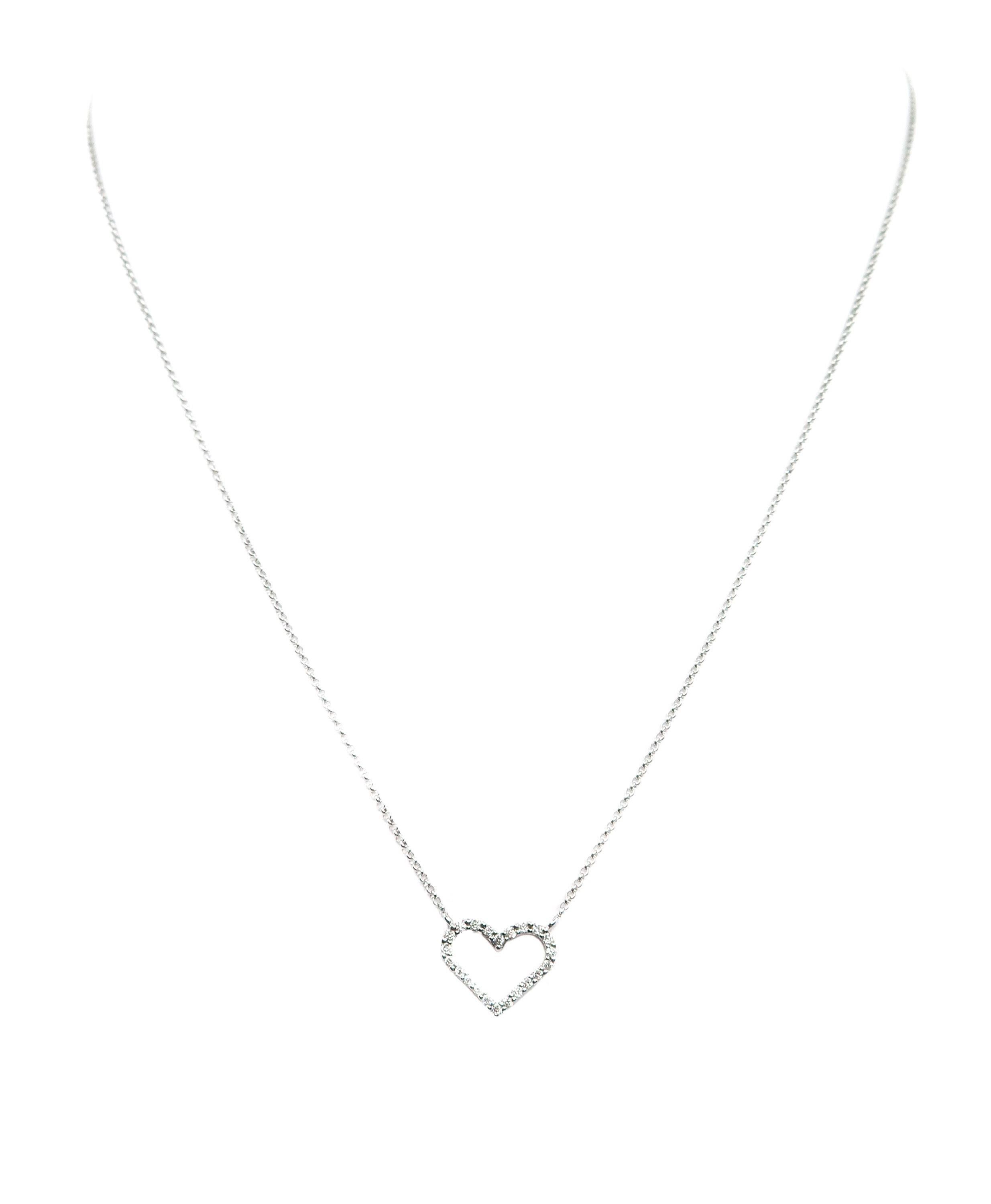 This charming and romantic diamond heart necklace shows her that she is always in your heart. It has 22 shimmering white diamonds weighing 0.20 carat total weight and is crafted in 14kt white gold.  Makes the perfect Valentine's Day/Anniversary Gift