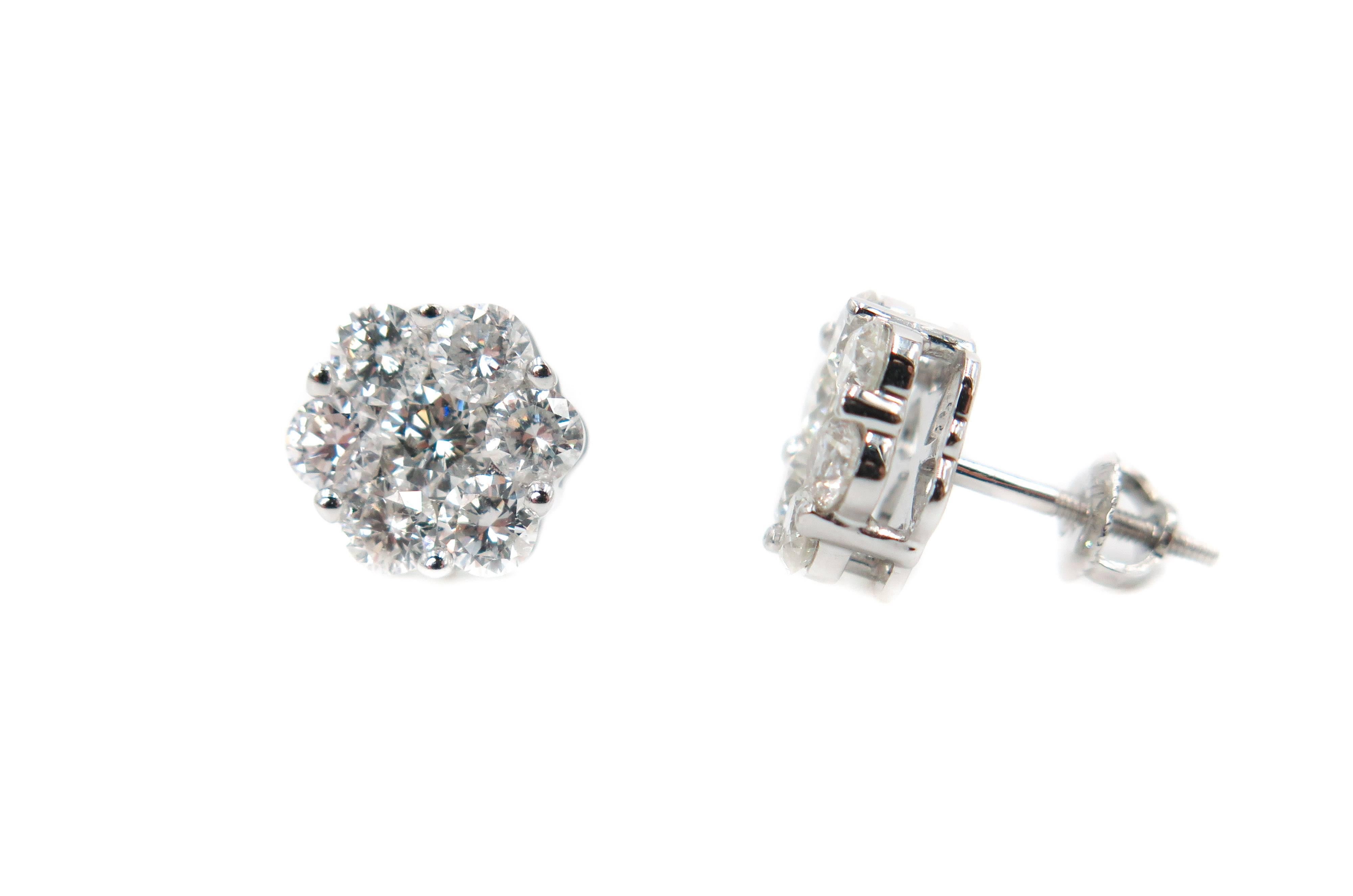 Sweet and special... this beautiful pair of earrings is just what you need :)
Handpicked and perfectly matched round cut diamonds, creatively set in white gold, blooms into this gorgeous pair of diamond earrings. The attention to detail and the