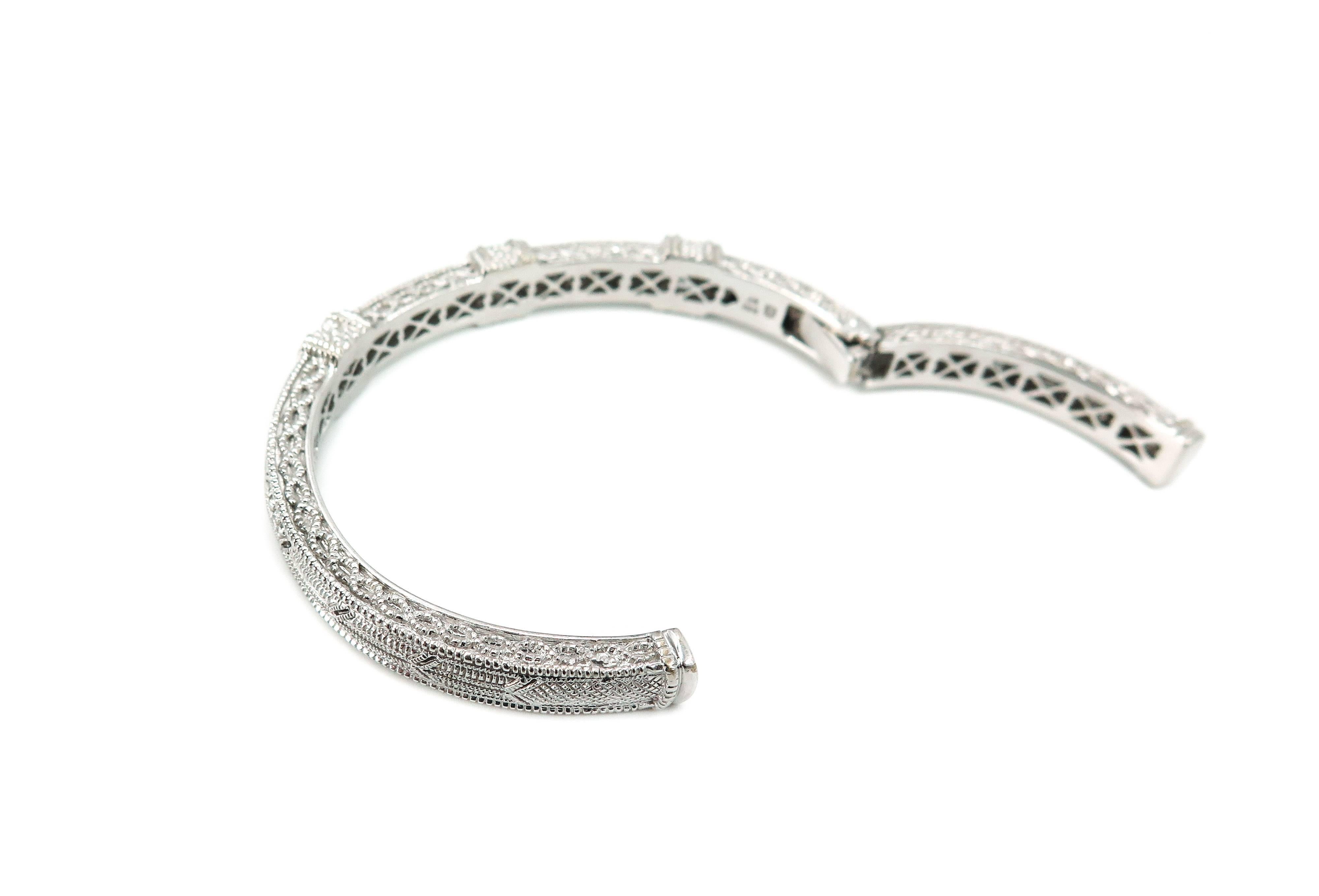 Judith Ripka combines beauty, and elegance in every design. 
This Bracelet is no different... Comprised of baguette and round diamonds, set in 18k white gold. 
Stunning and intricate lattice framework.
Size 7 inch 
