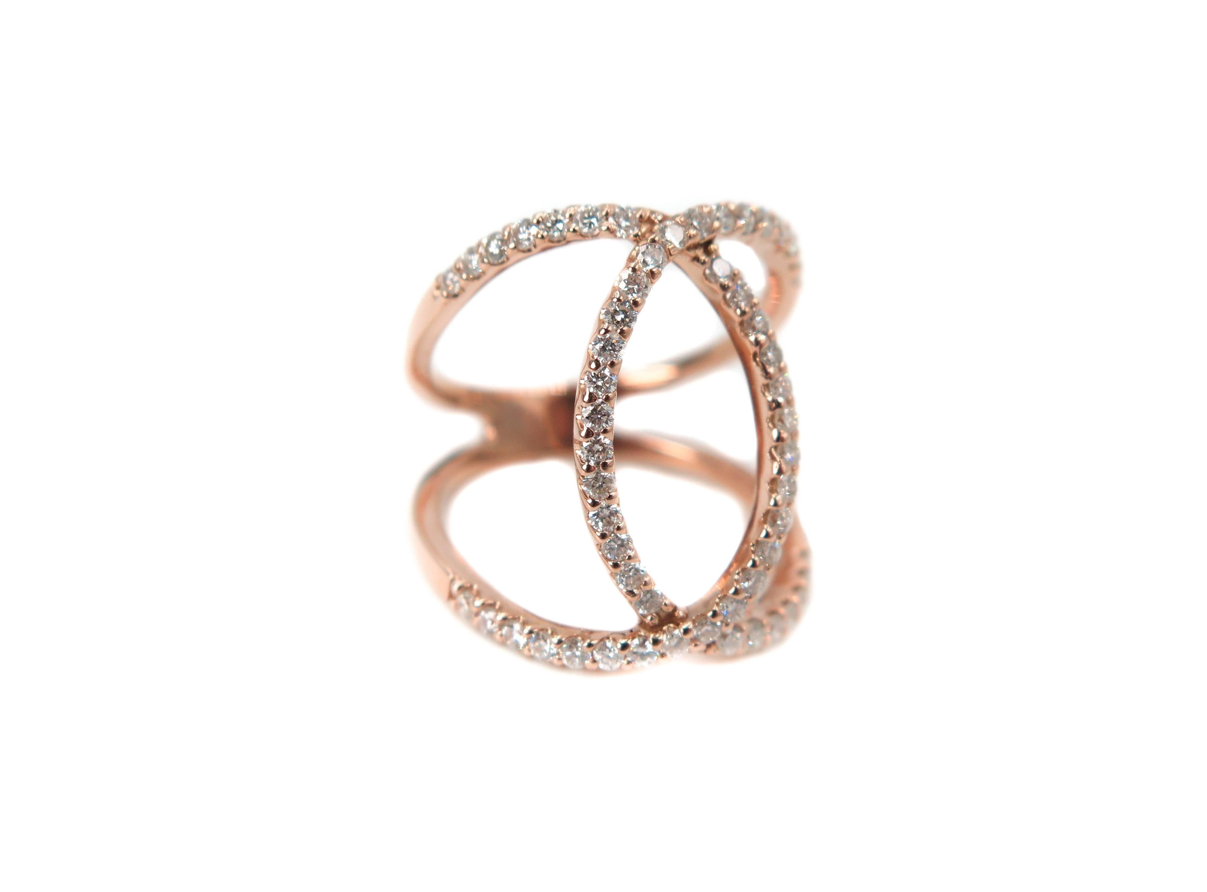 This Diamond Ring boasts two circles of diamonds overlapping for a chic, yet classic appeal. A design with modern trends, integrated with traditional elegance.
Crafted in 14k rose gold and set with approximately 0.50 carats of round brilliant cut