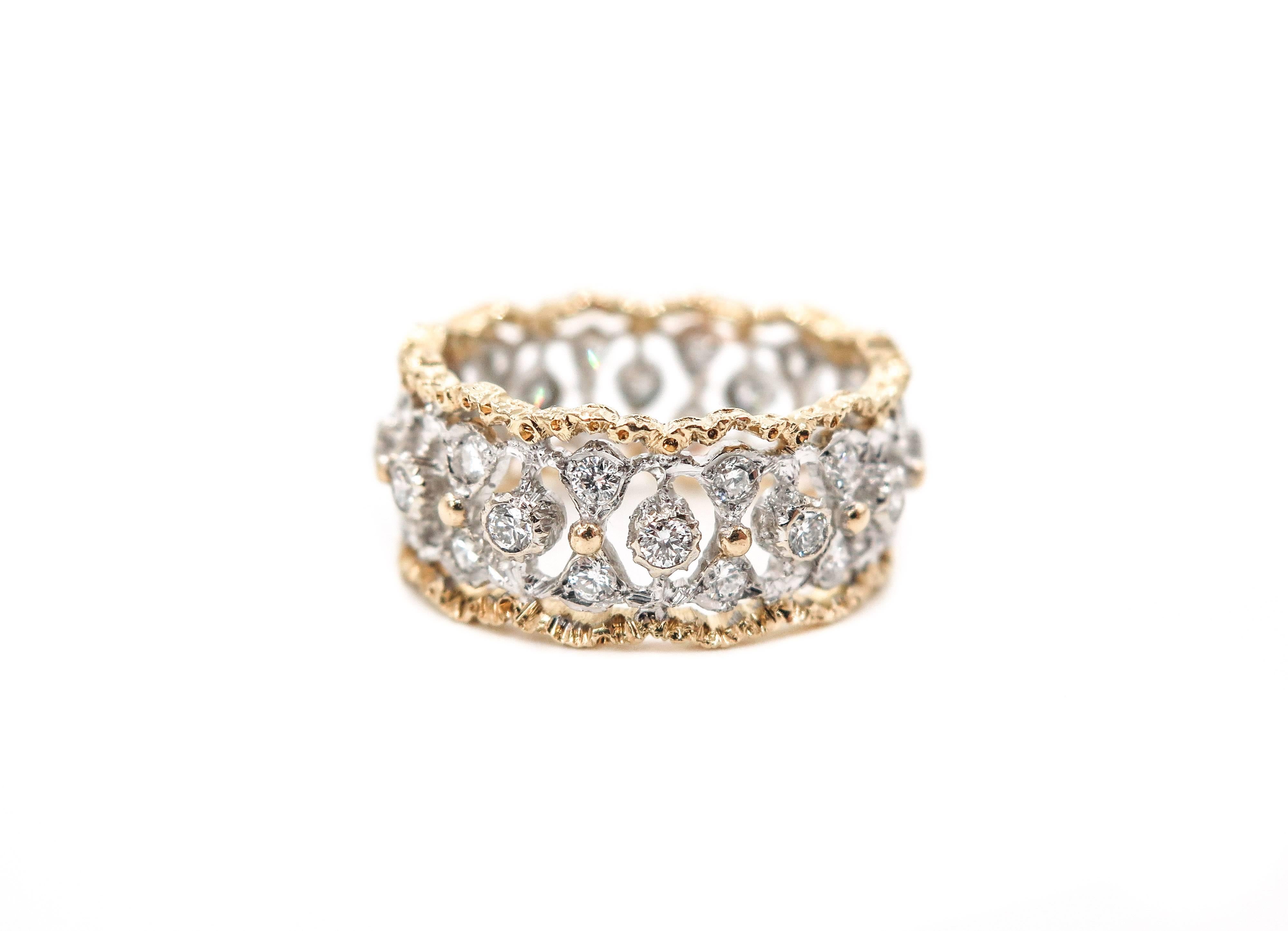Eternelle ring, an exquisite design by Buccelatti. Handcrafted in 18k white gold set with diamonds and scalloped yellow gold borders.
Finger size 7