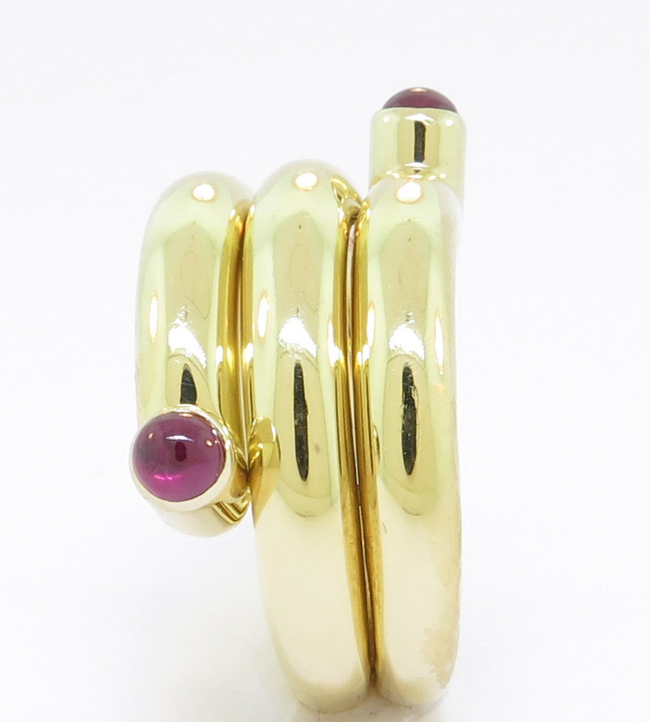 18K Yellow Gold Double Coil Ring by Jean Schlumberger for Tiffany & Company, set with 2 Cabochon Rubies. Size 7