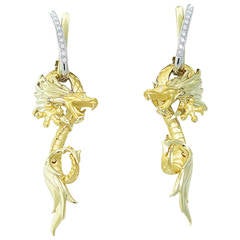 Carrera & Boucles d'oreilles dragon en or et diamants Carrera