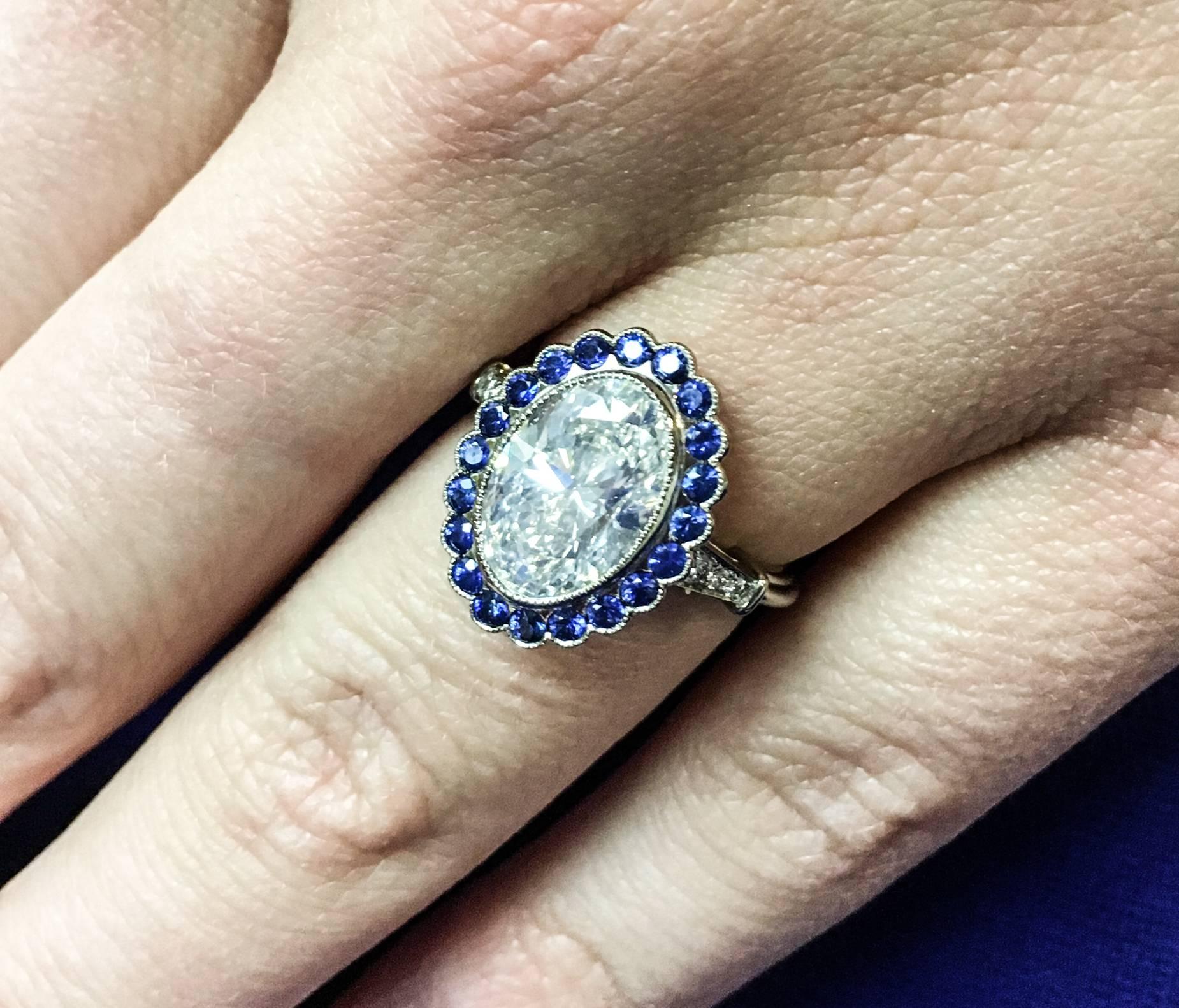 3.37 Carat Oval Diamond with Sapphire Halo White Gold Ring In New Condition In Greenwich, CT
