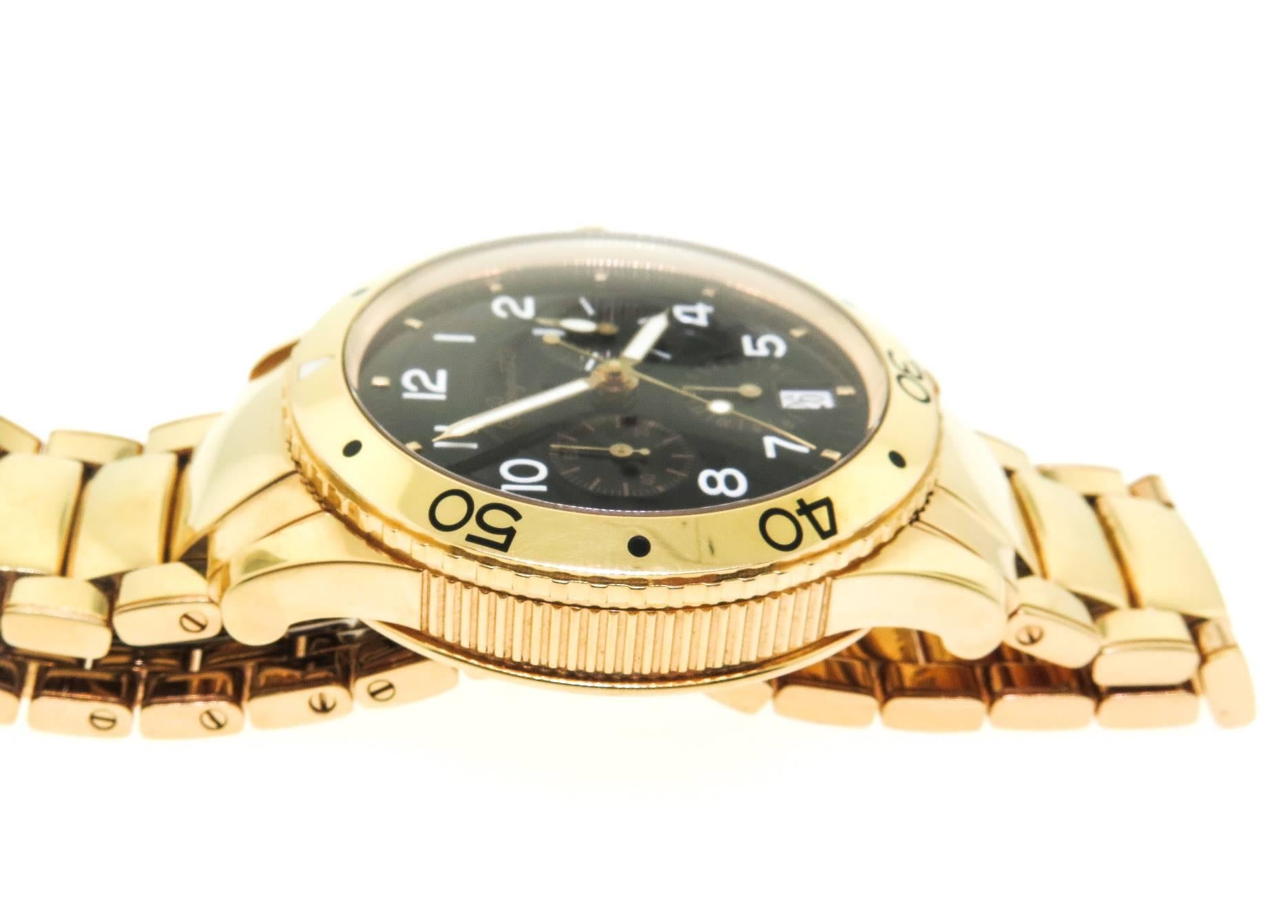 Beautiful Breguet Type 20. The watch is in excellent condition with a very pleasing black dial and white arabic numbers. Automatic chronograph movement, solid yellow gold case and bracelet. Original box and papers.

