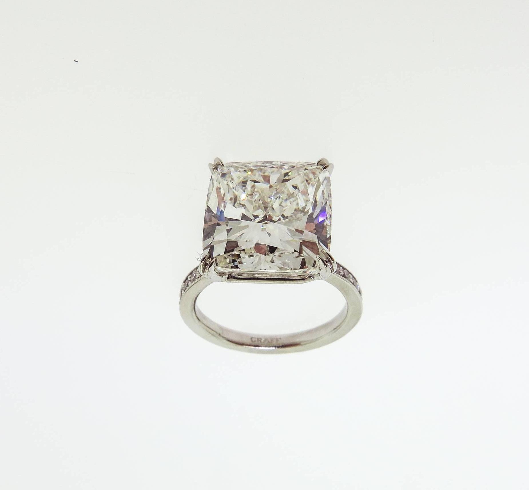 A gorgeous, bright white and beautiful 9.34 carat cushion-cut diamond set exquisitely in a beaded diamond eternity band creating a continuous flash of fire and scintillation across the finger, accompanied by a GIA Diamond Grading Report stating: H