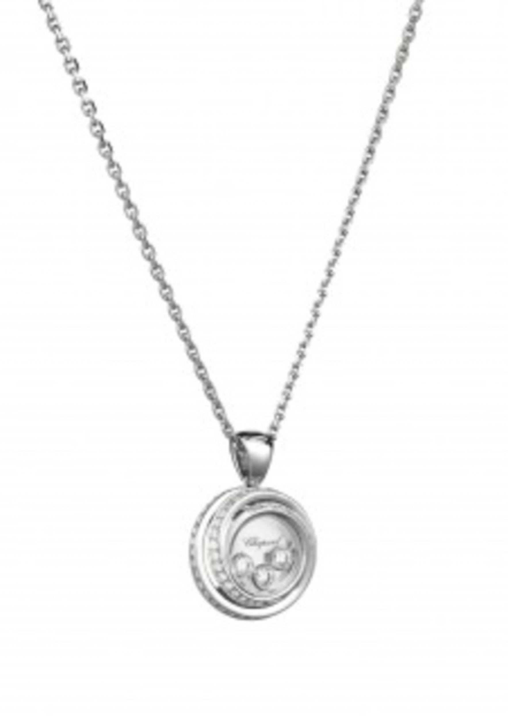 Stylish... this Happy Emotion Pendant set with diamonds in 18 karat white gold, the spiral of precious metal becomes a radiant nest of light, encircling 3 moving diamonds between their sapphire crystals as they perform the most beautiful and
