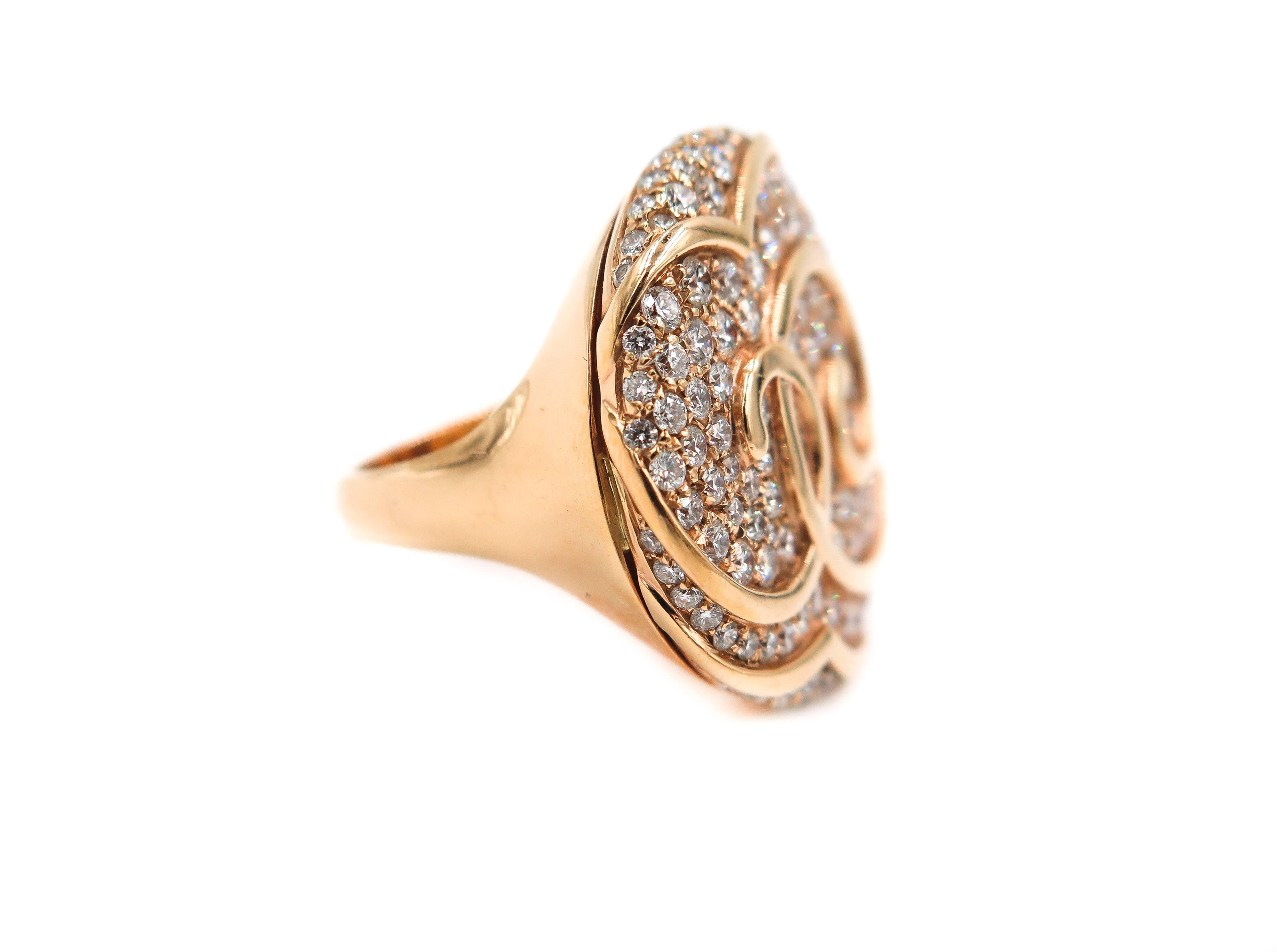 Excitement, amazement and surprise are just a few of the emotions evoked by this amazing ring!
Handcrafted in 18k rose gold and paved white round diamonds, totaling 2.80 carats.
The swirling pattern evokes a sense of fluidity and depth, perfect for