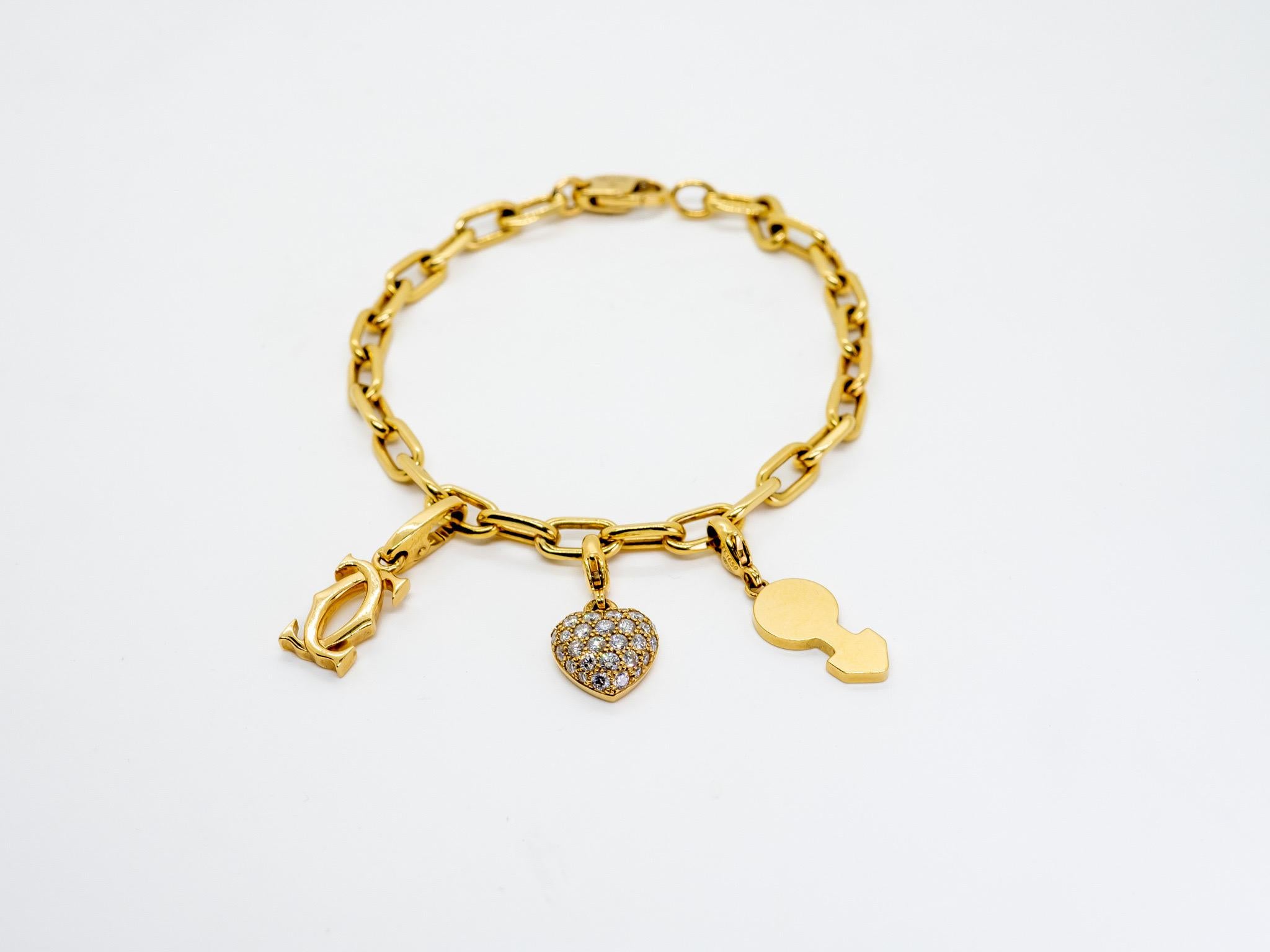 Cartier: 18 Karat Gold Charm-Armband für Damen oder Herren im Angebot