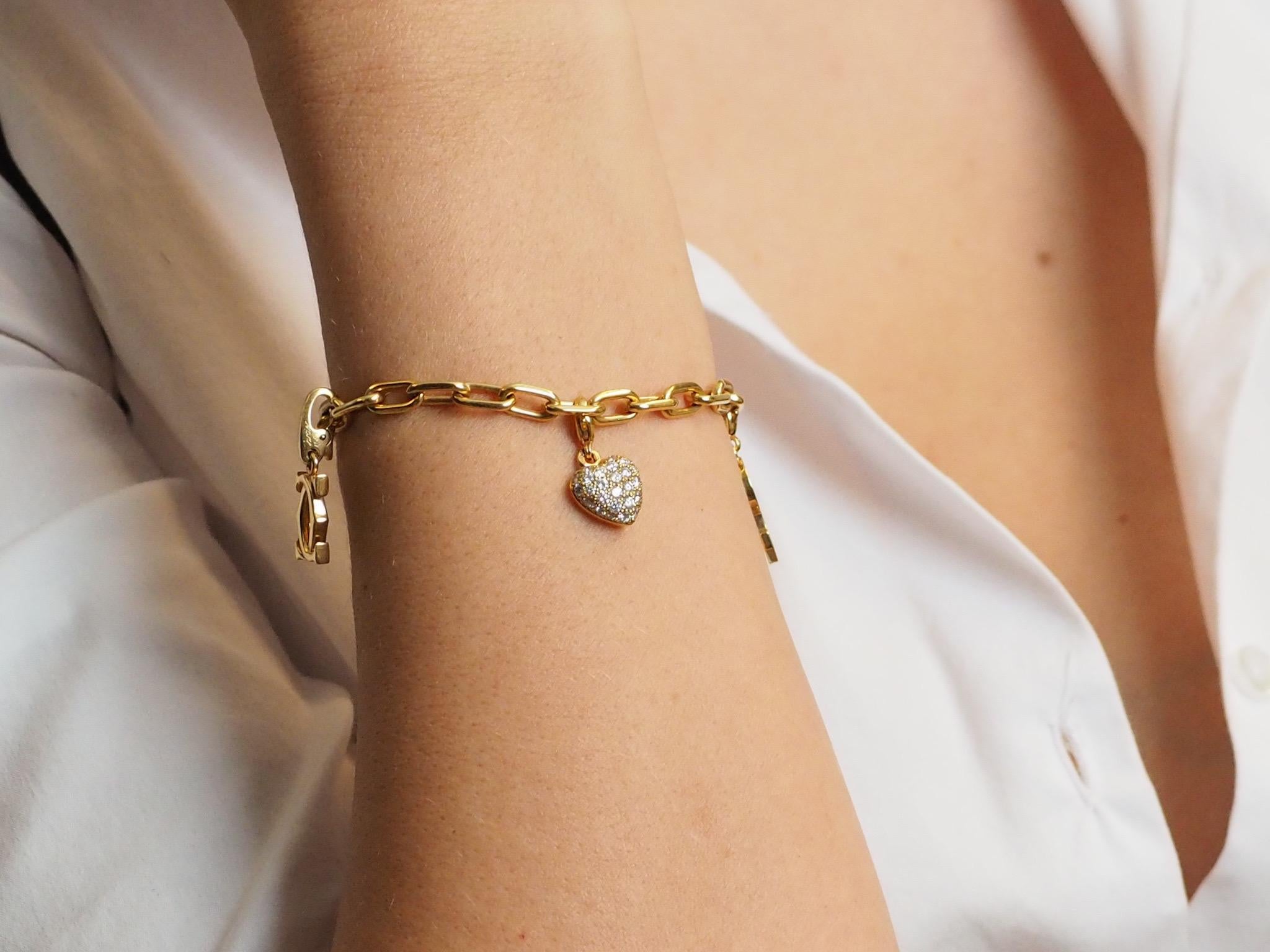 Cartier Bracelet à breloques en or 18 carats Unisexe en vente