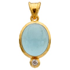 Pendentif en or 18 carats de Steven Battelle, avec une aigue-marine cabochon de 6,5 carats et un diamant