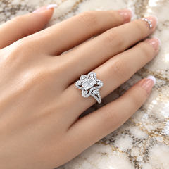 Vitolo Ring aus 18-karätigem Weißgold mit Blumenmotiv und Baguette-Diamanten