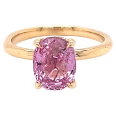 2.23 Carat Pink Sapphire and Diamond Hidden Halo Ring set in 18K Yellow Gold