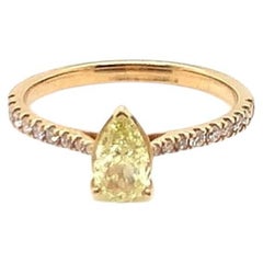 0.71 Carat GIA Certified Pear Shape Yellow Diamond Ring in 18K Yellow Gold