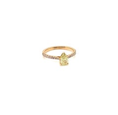 0.71 Carat GIA Certified Pear Shape Yellow Diamond Ring in 18K Yellow Gold