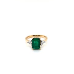 1.78 Carat Emerald and Diamond Three-stone Ring in 18K Yellow Gold and Platinum