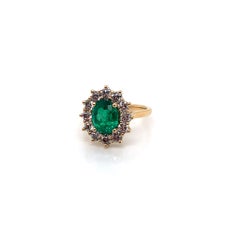 2.07 Carat Oval Shaped Emerald Cluster Ring with 12 Diamonds in 18K Yellow Gold