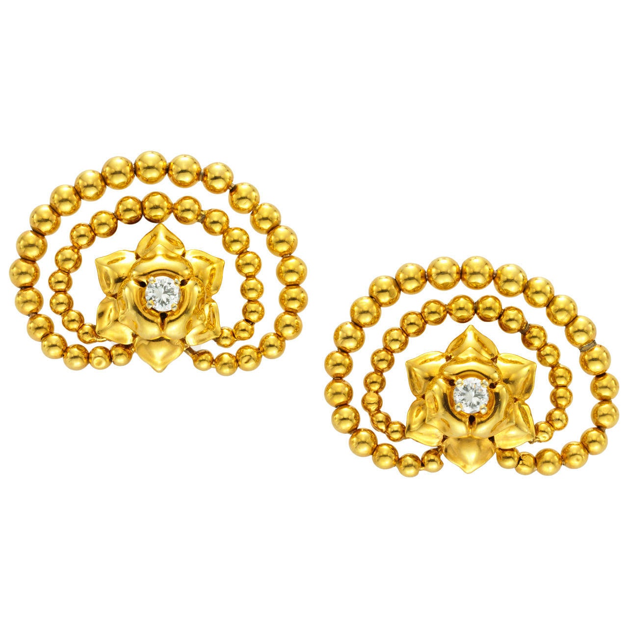 Cartier, A Pair of Retro Gold and Diamond Ear Clips For Sale