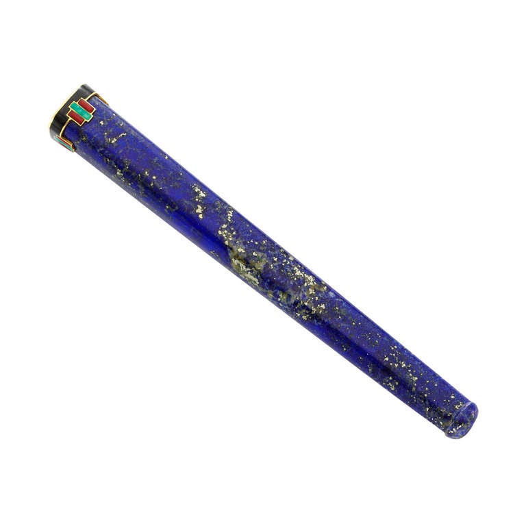 Cartier, An Art Deco Lapis Lazuli, Enamel and Gold Cigarette Holder