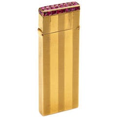 Van Cleef & Arpels A Ruby and Gold Lighter