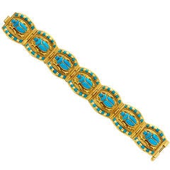 A Glass and Gold Scarab Bracelet