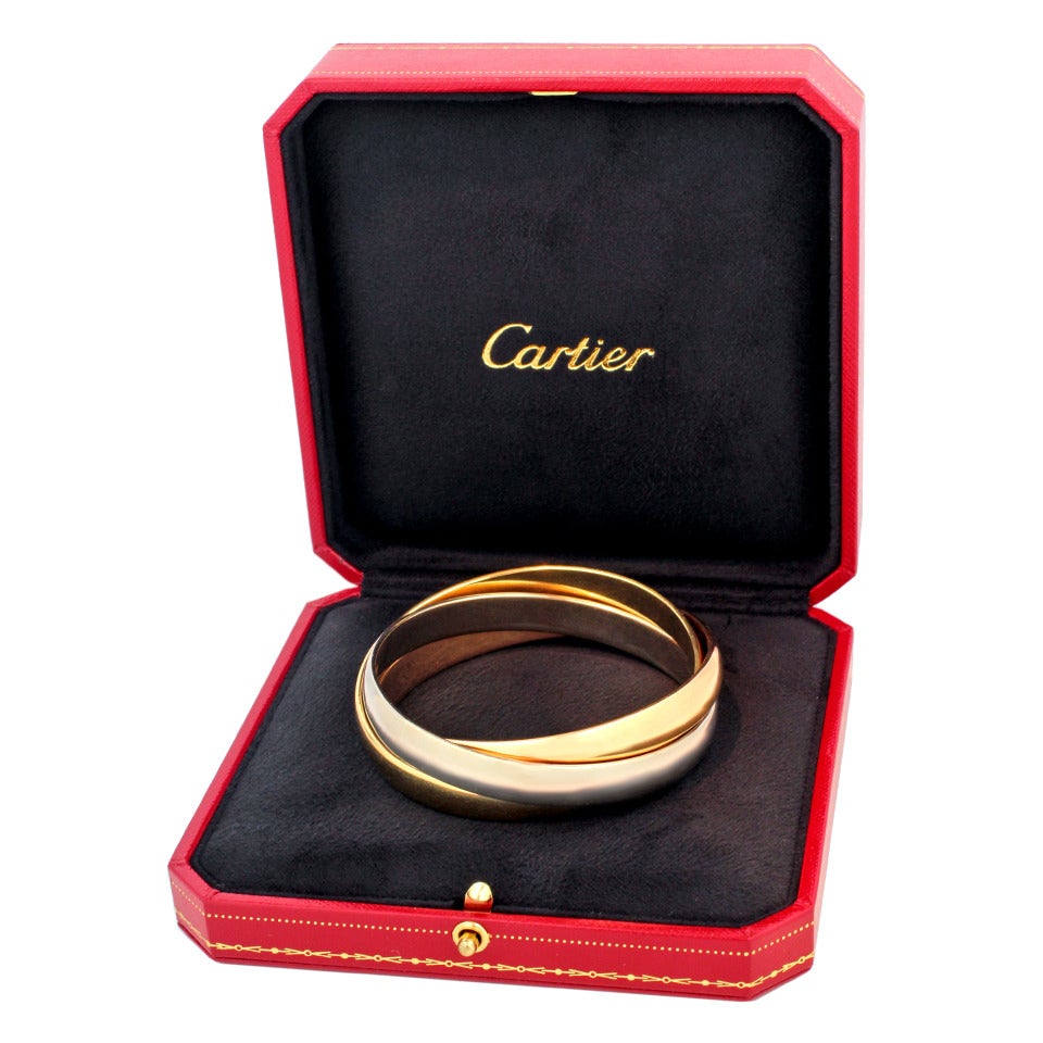 Cartier Extra Wide Trinity Gold Bangle Bracelet In Excellent Condition In Litchfield, CT