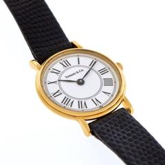 Chic Tiffany & Co. Roman Numeral Gold Wrist Watch