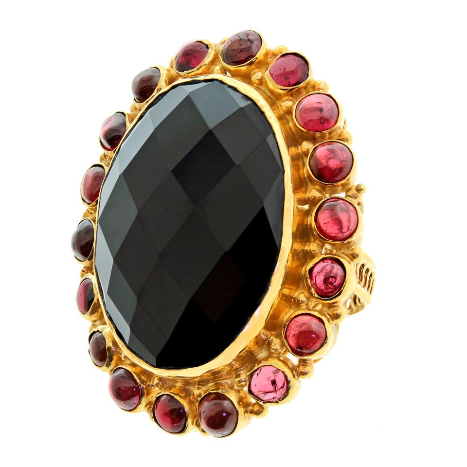 Circa 1960s, 14k. This fabulously large sixties ring is cool vintage chic, playfully elegant or daringly Goth - take your pick.  Dressed up or down, it's fashion jewelry at its gold and massive gemstone best. Handmade with an intricate wirework