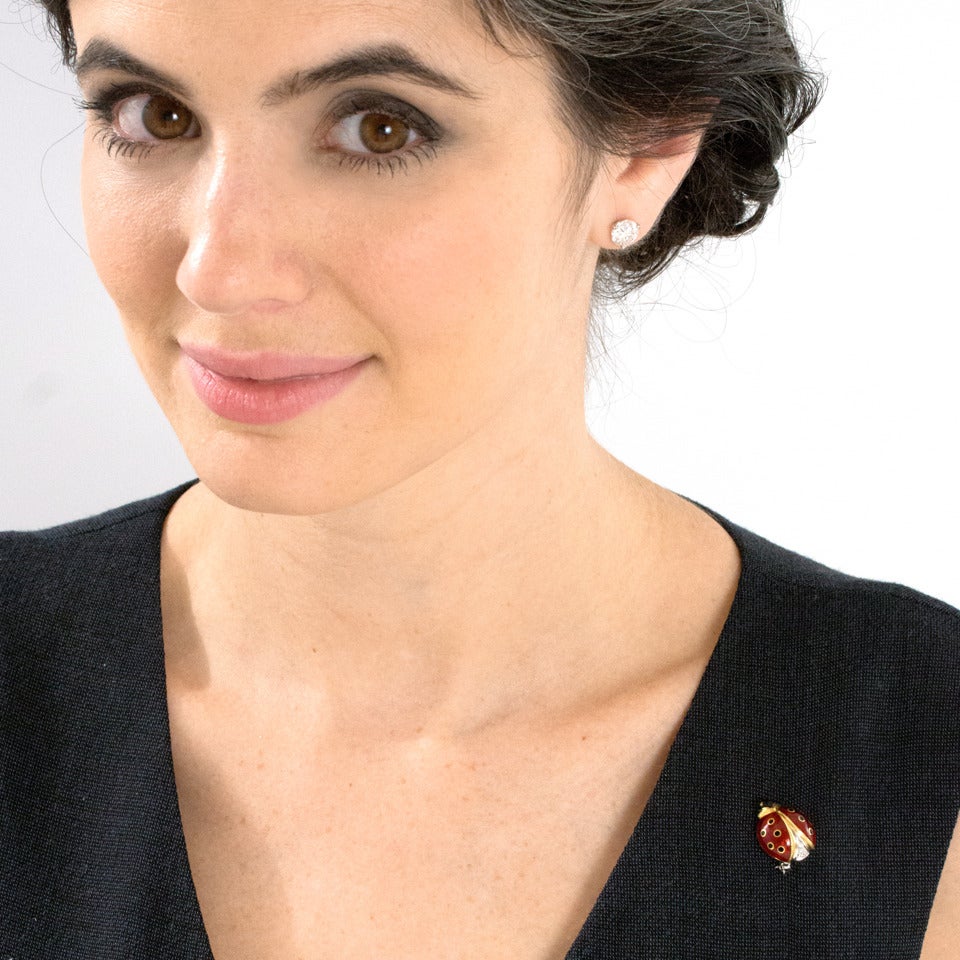 Circa 1990s, 18k, Wempe, Germany. This whimsical ladybug pin is meticulously detailed. Polished yellow and white gold, black enamel, red enamel, and diamonds come together, making this brooch utterly irresistible. Wempe is renowned for fine quality.