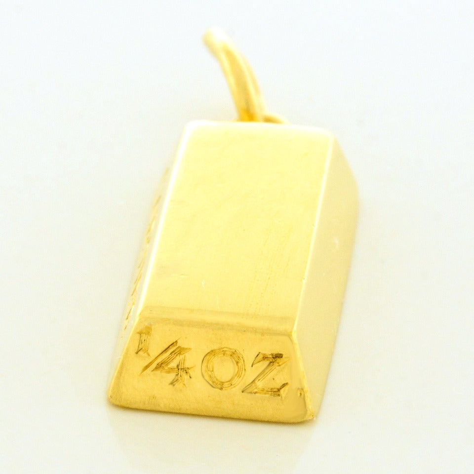 cartier gold ingot pendant