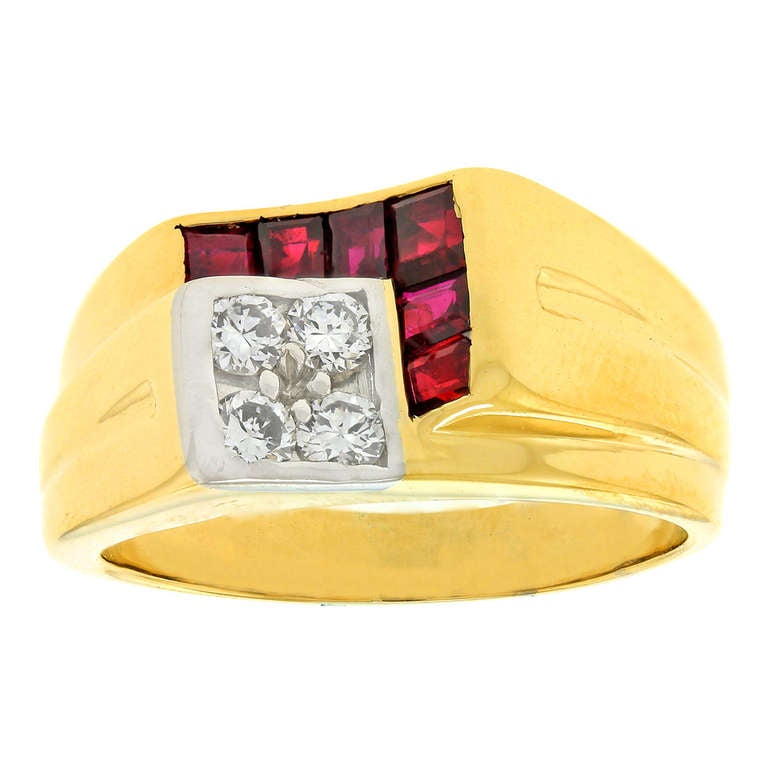 his urbane  Cubist ring by Tiffany & Co. is set with .60 carats of fine natural rubies and .26 carats of brilliant white diamonds. Its fabulous mid-century look is perfect for any century fashion.  

Remarks from Lawrence Jeffrey:   “Looking at