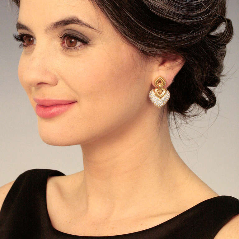 Set with 3.24 carats of superb diamonds, these earrings have that subtly Mogul vibe Bulgari is famous for.  Part of the Doppio Cuore style set, they are sophisticated day to night pieces.  Excellent condition. 

Remarks from Lawrence Jeffrey:  