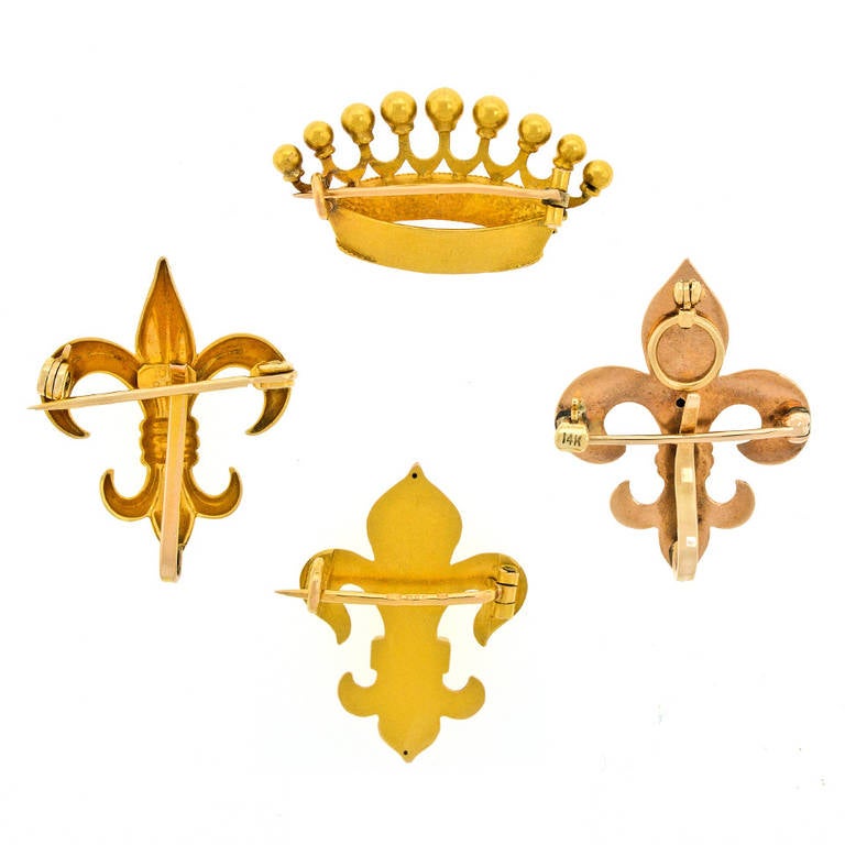 Victorian Grouping of Four Fleur-de-Lis and Crown Brooches
