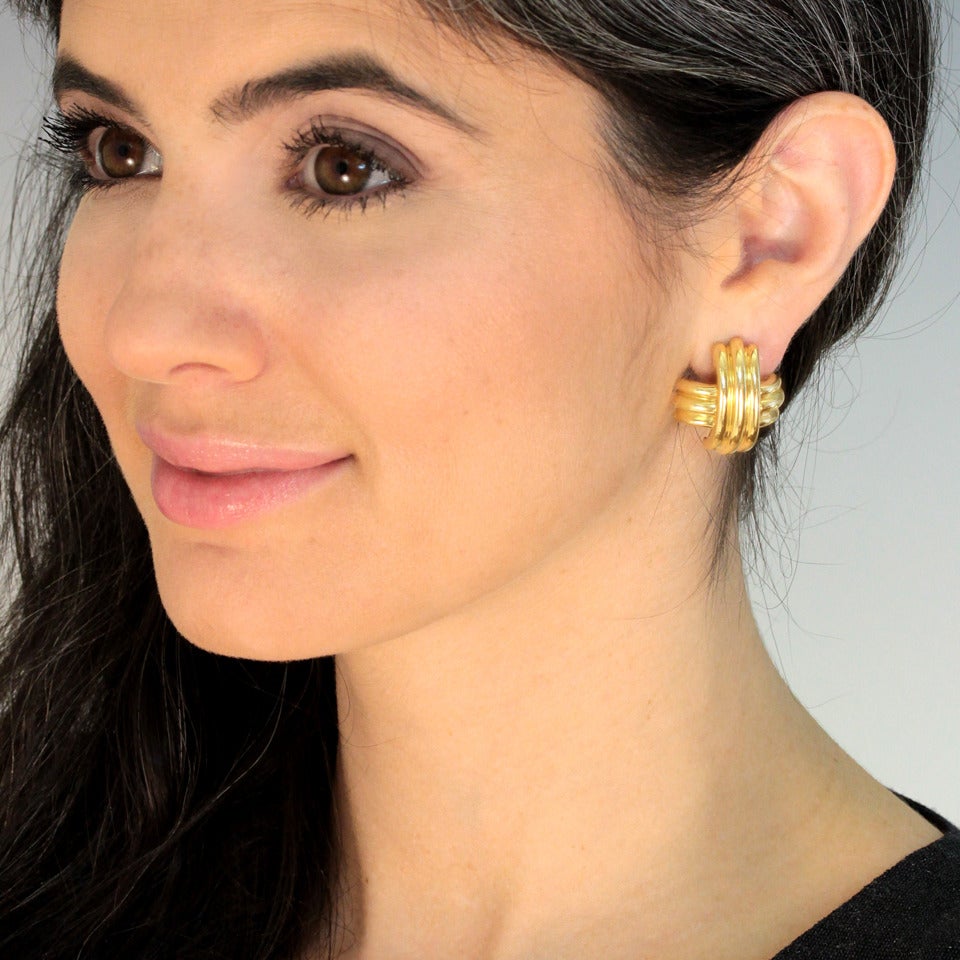 Circa 1991, Tiffany & Co. This pair is the larger size of the classic Tiffany signature motif earrings. Visually bold yet stylistically understated, these are perfect earrings for any fashion moment.  

Remarks from Lawrence Jeffrey: “Yellow Gold