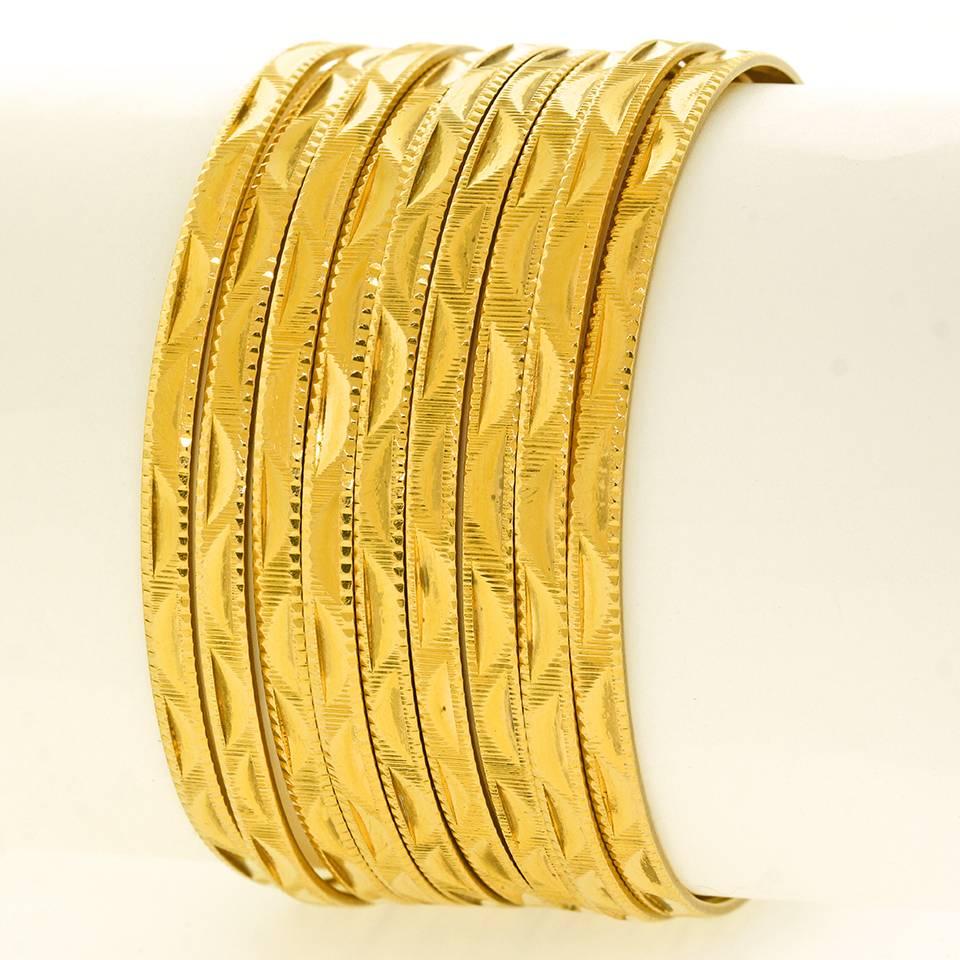 Nine Gold Bangle Bracelets 3