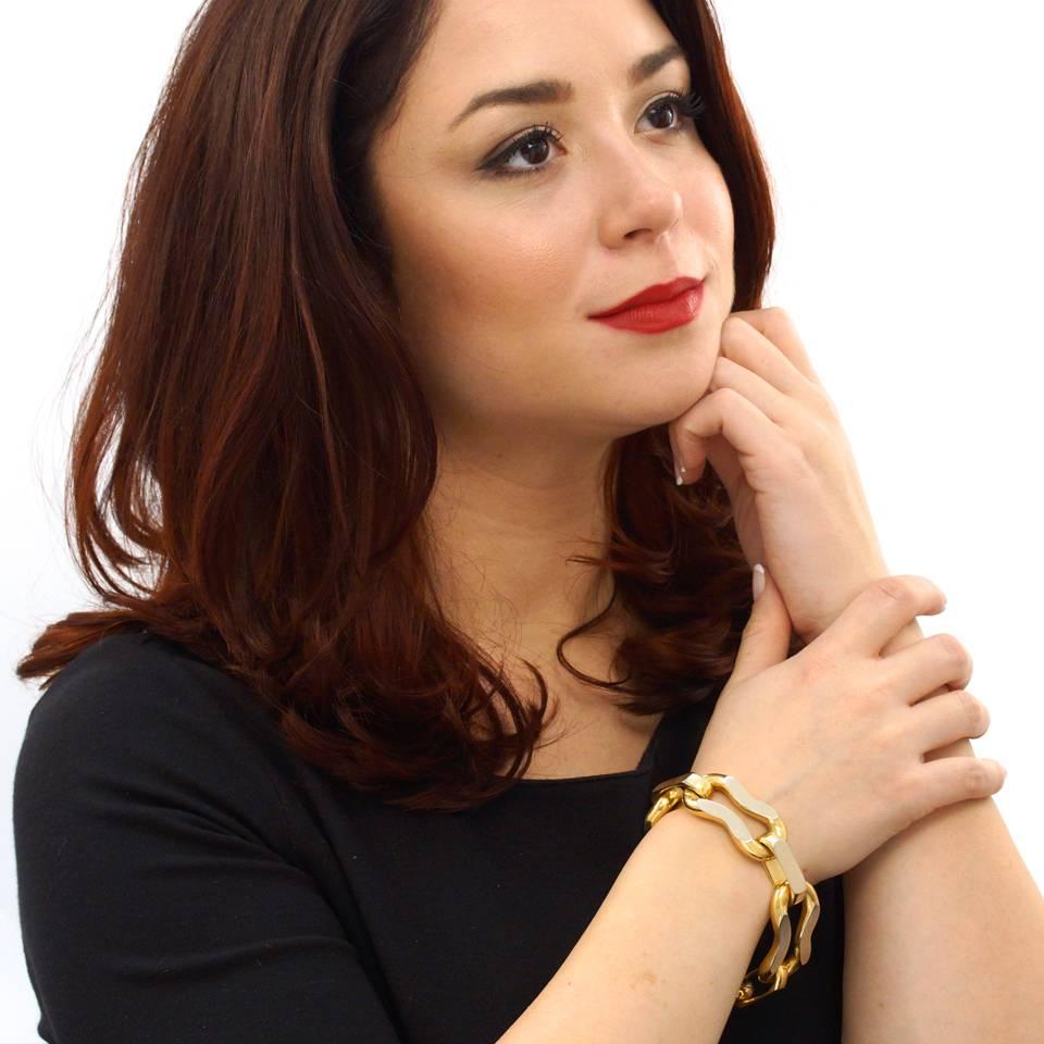 Circa 1950s, 18k, Van Cleef & Arpels.This chic 18k bracelet by Van Cleef and Arpels is everyday gold at its fashionable French best. The unusually shaped links are yellow gold with a distinctive white gold finish applied to their tops. This
