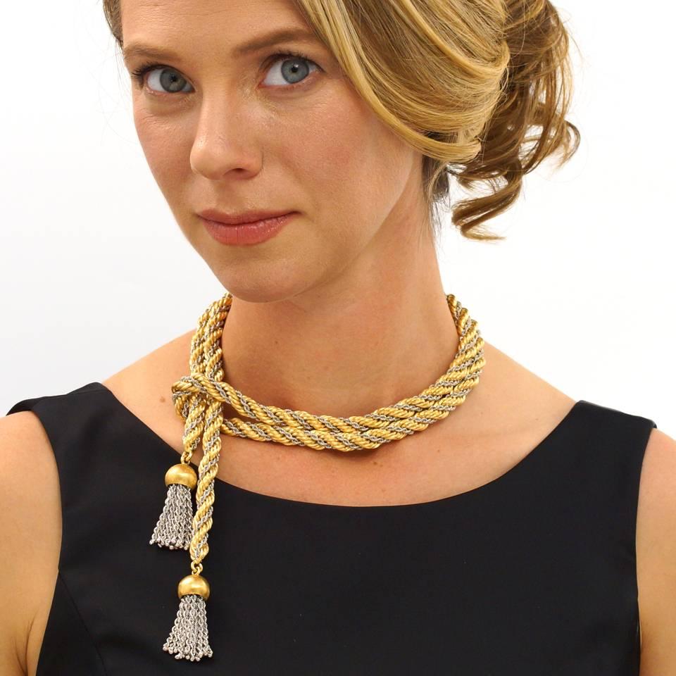 Circa 1970s, 18k, Tannler, Zurich.  This sophisticated 18k gold accessory by Tannler of Zurich puts a sumptuous spin on the classic lariat necklace. The heavy roping is comprised of a huge yellow gold twist wound with a slimmer white gold chain.