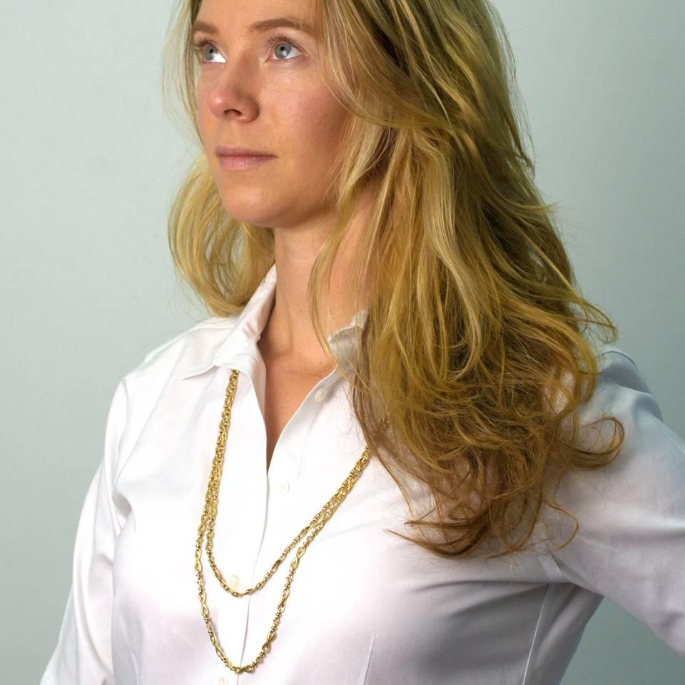 Circa 1880s, 18k, France.  This 60-inch chain is part of one of the chicest style sets in existence. The look is town and county vintage chic at its Francophile best. The beautiful hand-worked links are unusually designed and deliciously