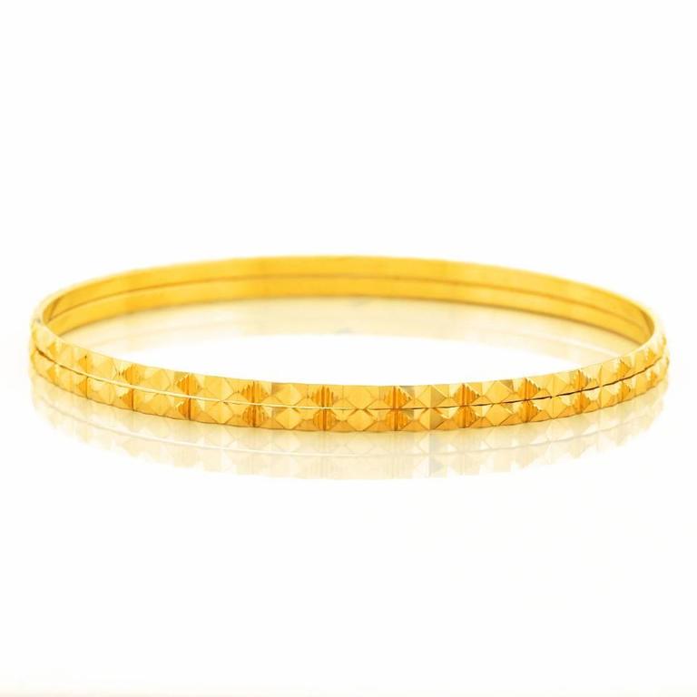 Pair of High-Karat Gold Bangle Bracelets at 1stDibs