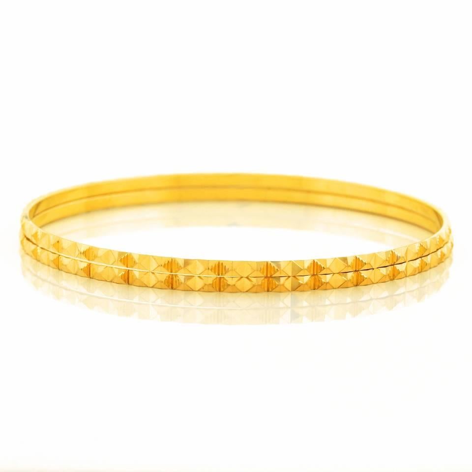 Pair of High-Karat Gold Bangle Bracelets