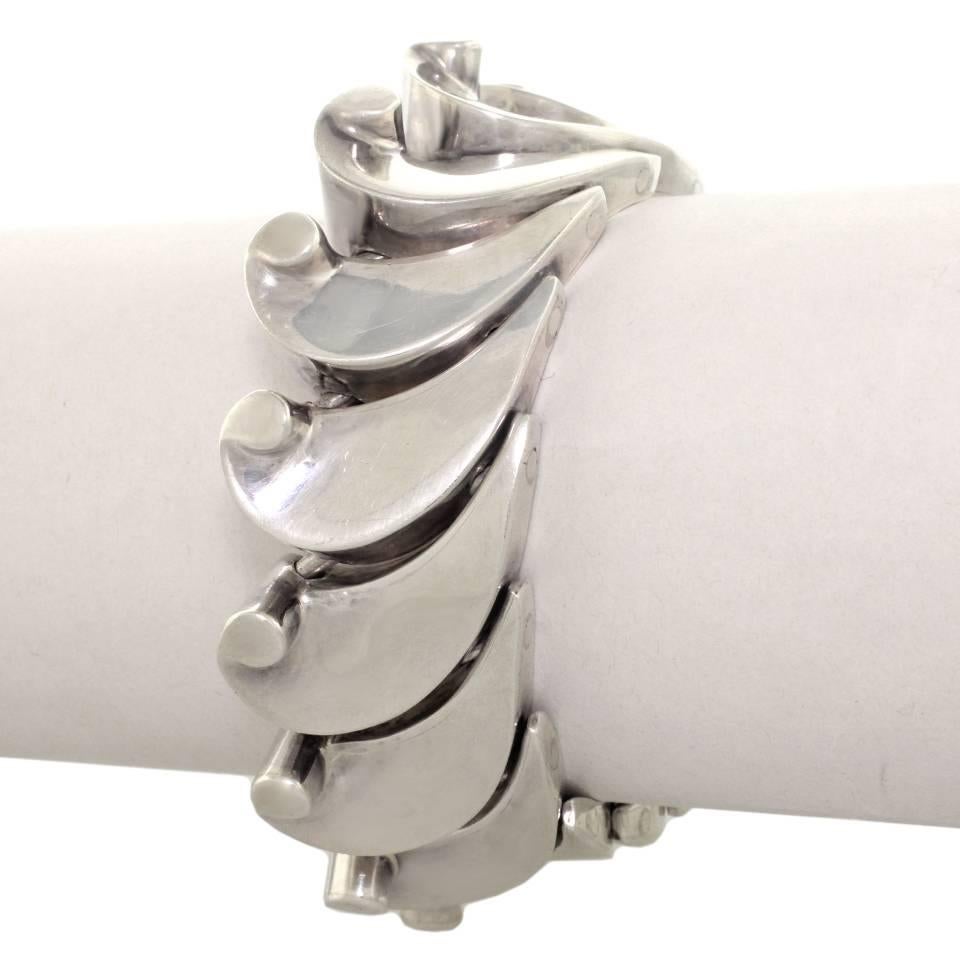 Circa 1950s, sterling, Antonio Pineda, Mexico.  Marrying traditional Mexican design values to the contemporary perspective, Antonio Pineda created a unique narrative in silver. His “Wave” bracelet is a chic example of his organic approach to the