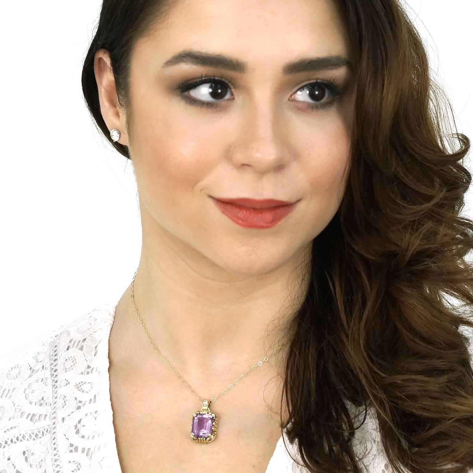 Circa 1960s, 14k, American.  This stylish pendant features a lush 11 carat Rose de France amethyst and a brilliant .10 carat diamond (I color, SI1 clarity).  Its stylish Deco-meets-modern look is underscored by meticulous fabrication. 

Noted,