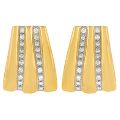 Superbes boucles d'oreilles des années 70 serties de diamants