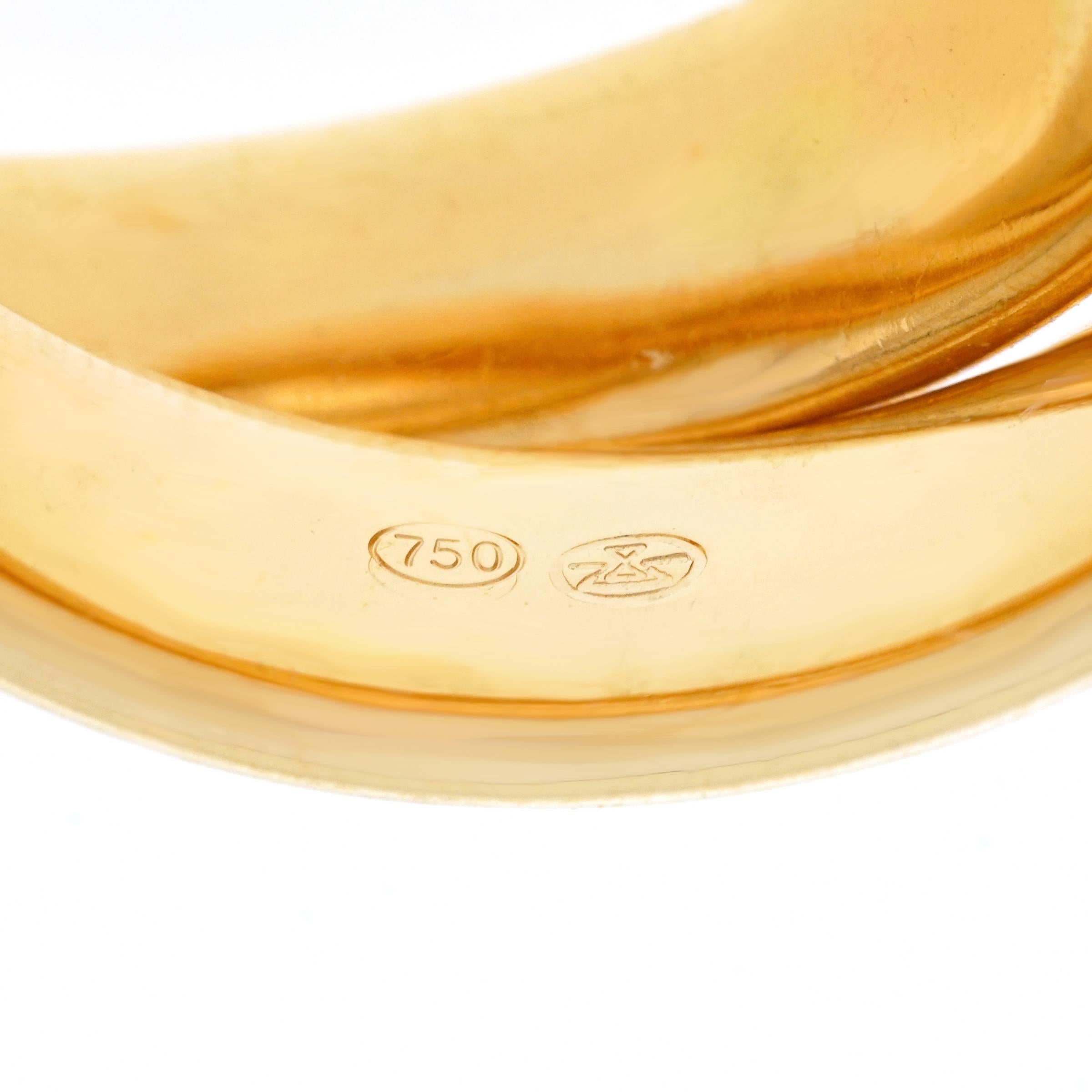 Gubelin Rolling Motif Gold Ring 1