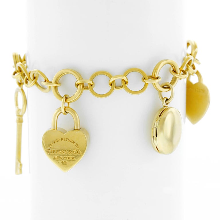 Tiffany Lock And Key Gold Charm Bracelet For At 1stdibs Tiffany Lock And Key Gold Charm Bracelet In Excellent Condition For Litchfield Ct
